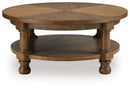 Chadworth - Round Cocktail Table - Medium Brown