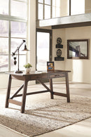 Baldridge - Home Office Large Leg Desk - Rustic Brown